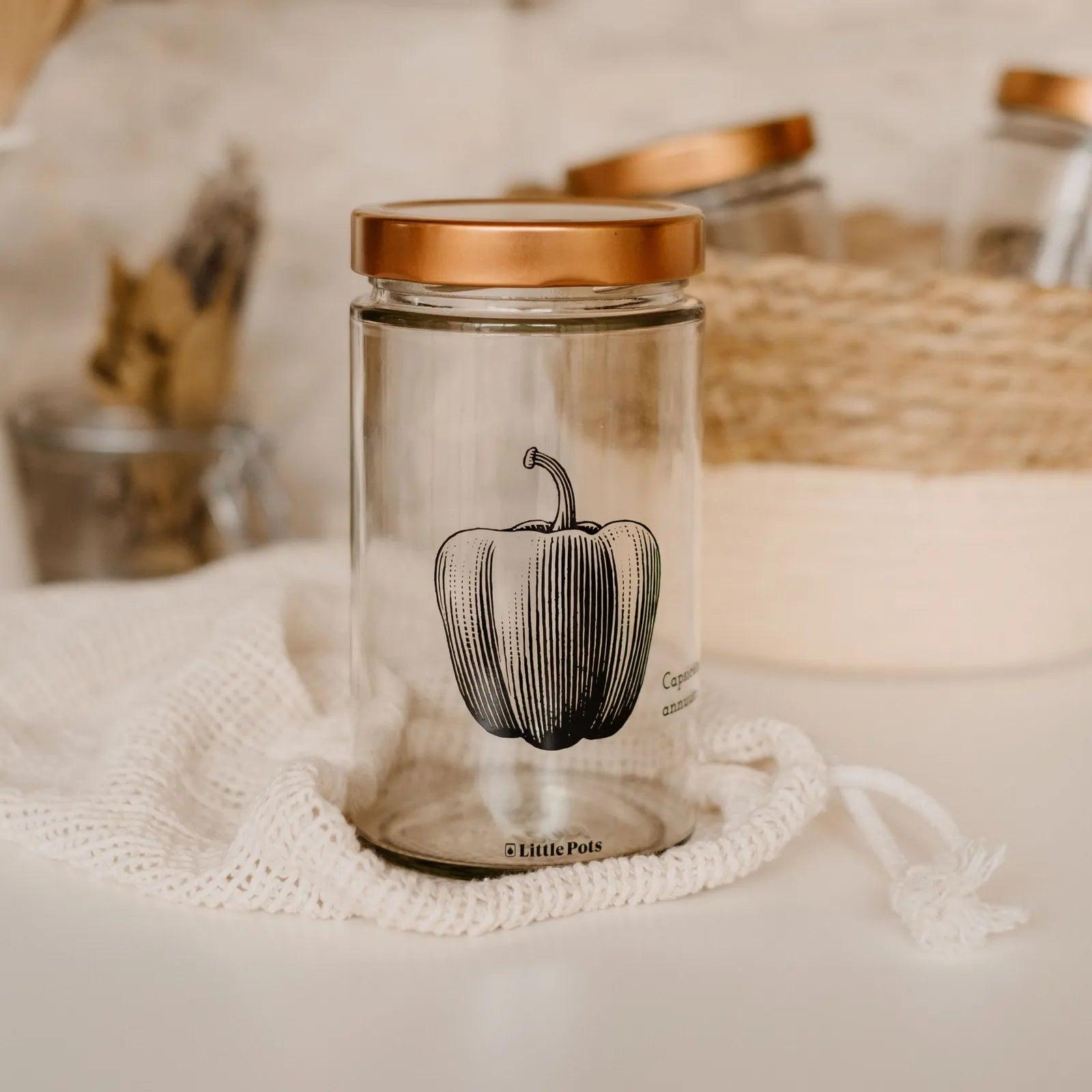 bocal en verre décors poivron couvercle cuivre