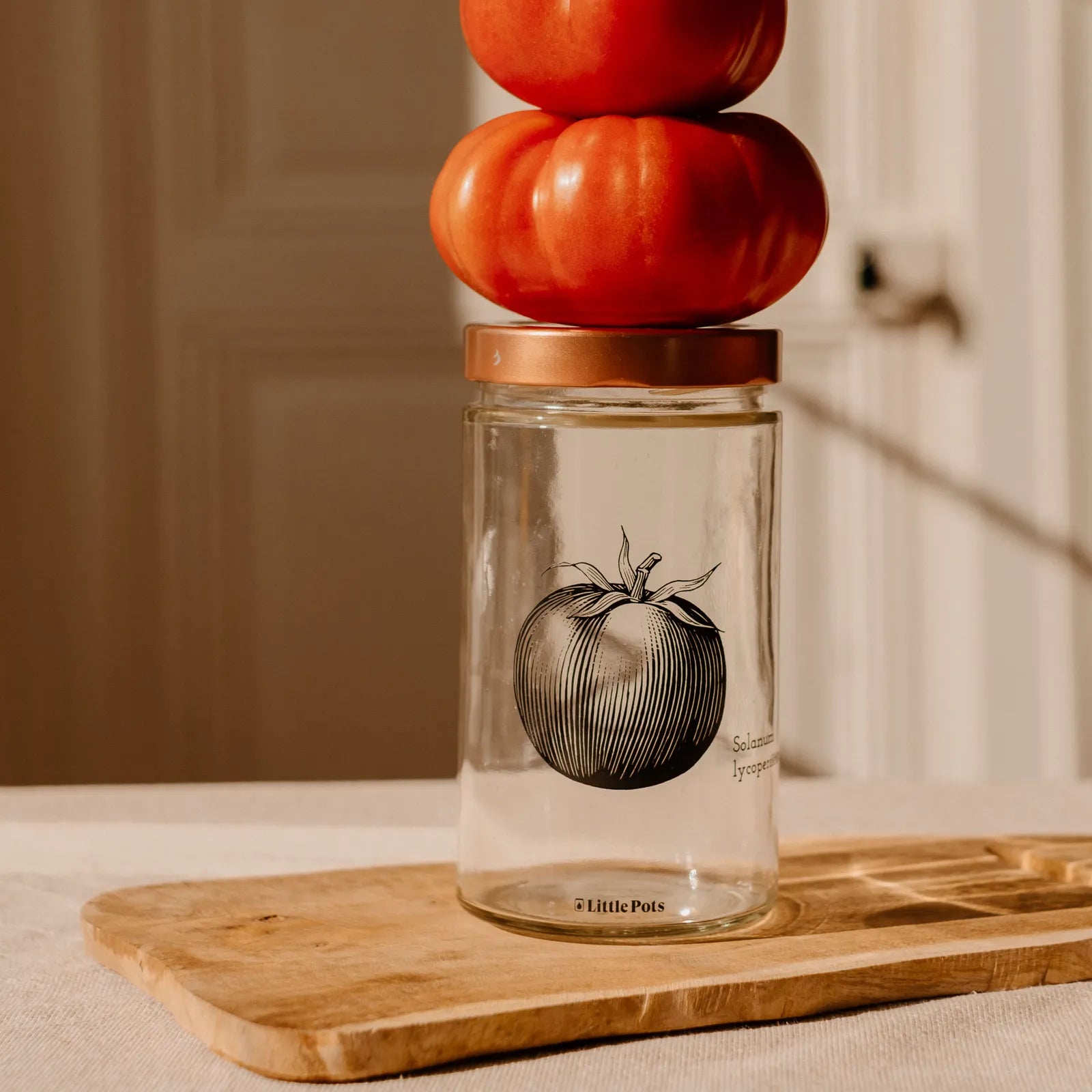 bocal en verre décors tomate avec couvercle cuivre